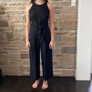 Black sleeveless jumpsuit